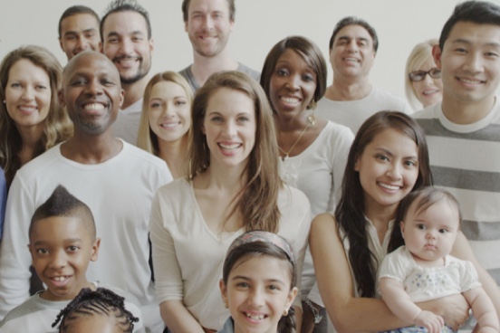 14 individuals of many ages and racial backgrounds